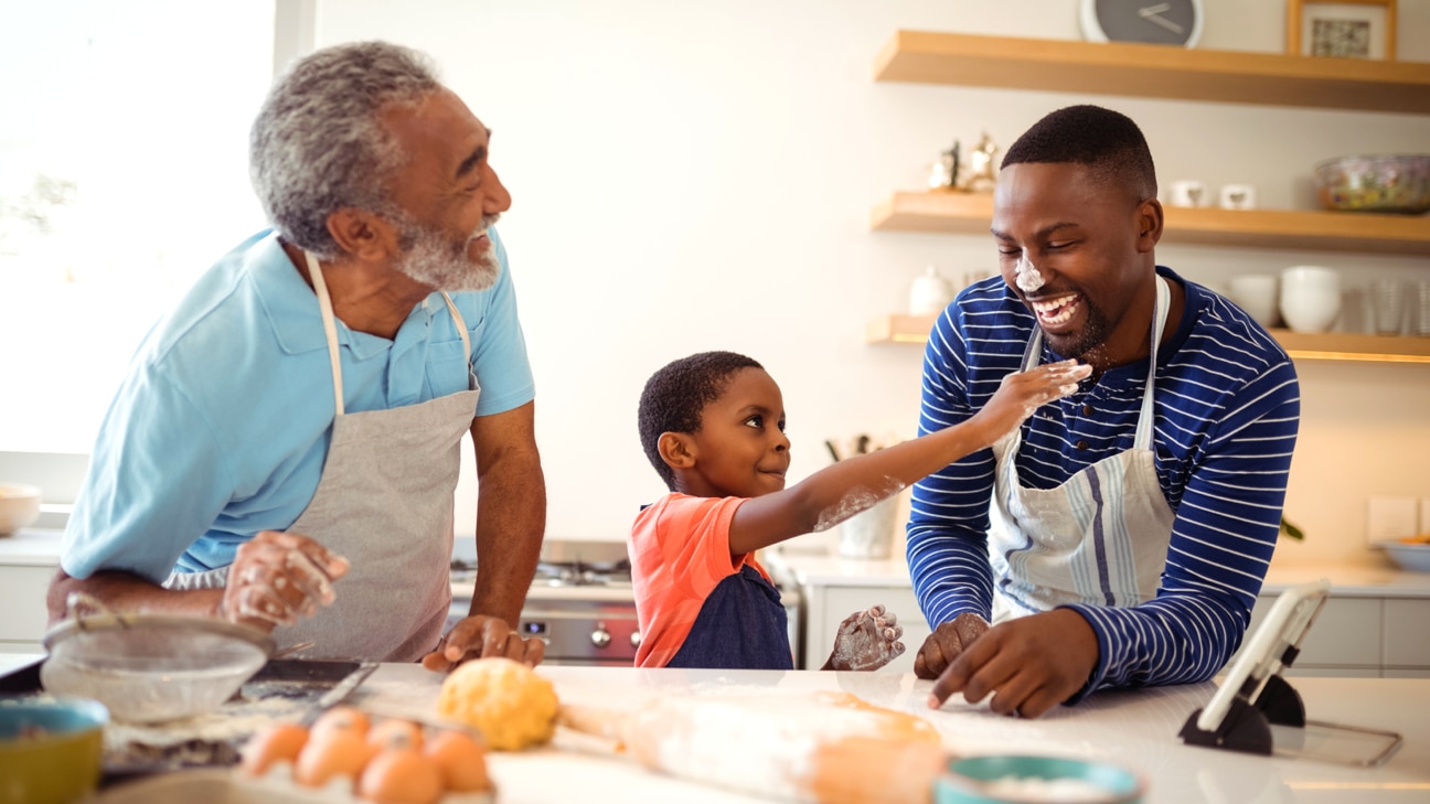 Three generations of a family laughing together